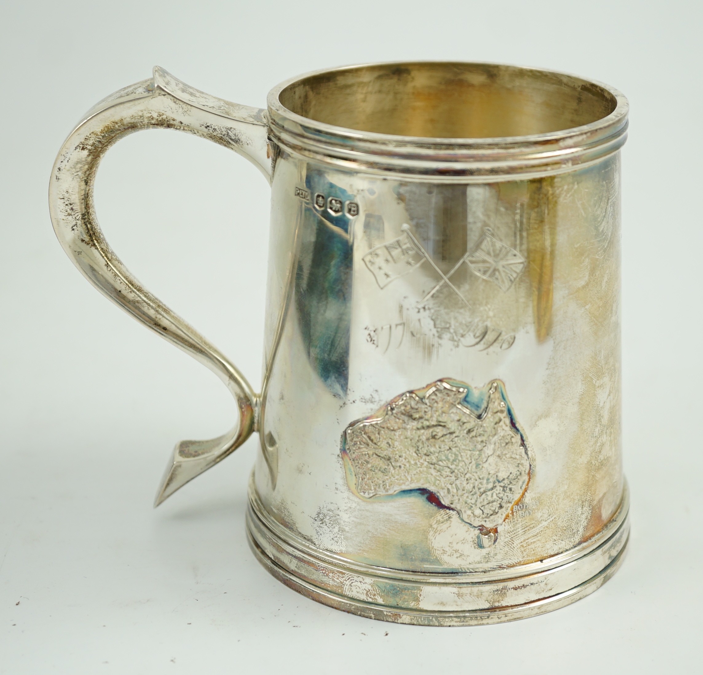 A cased Elizabeth II silver limited edition mug, engraved to commemorate the voyage of Lt. James Cook, in H.M. Bark Endeavour, to Australia